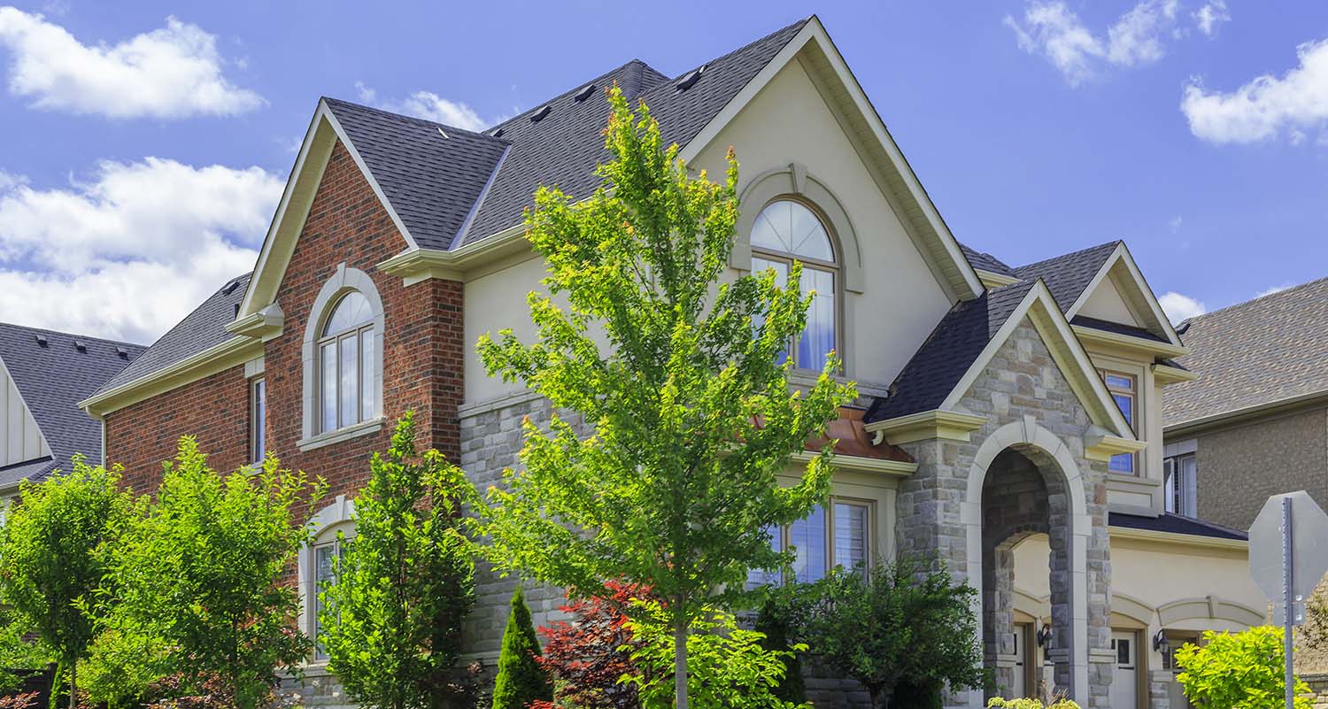 Luxury house exterior seen while performing home inspection services